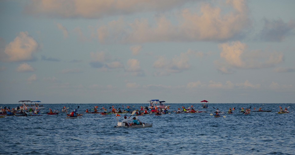 The kayakers: every swimmer must have a support vessel with them throughout the swim. This is at the beginning of the race.